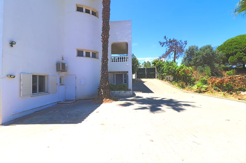 The driveway beside the villa