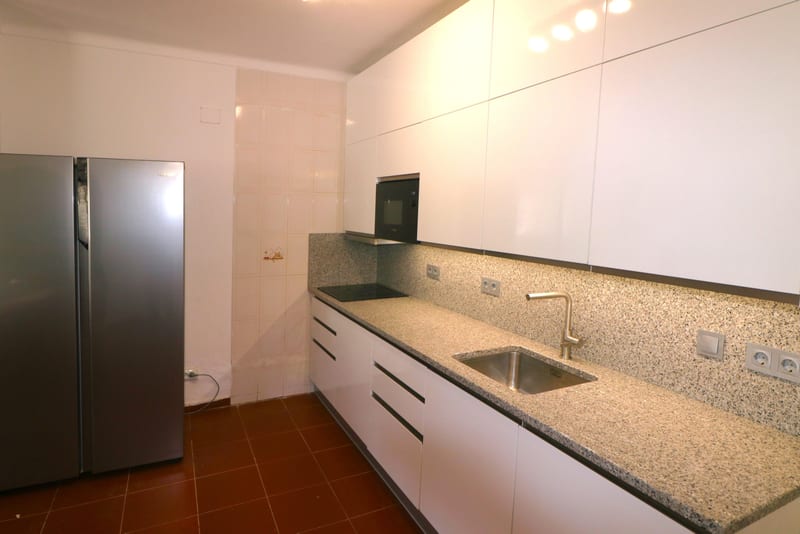 Kitchen with an American fridge-freezer
