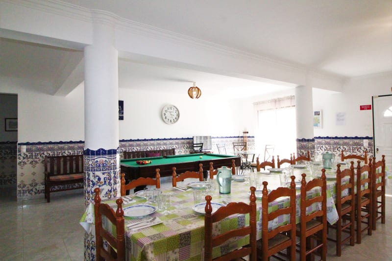 Indoor dining table beside the snooker table