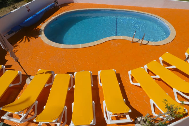 The pool and sun loungers from above